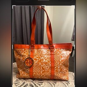 Tory Burch Coated Canvas Tote orange and white pattern. (Tory Burch Jane Tote)